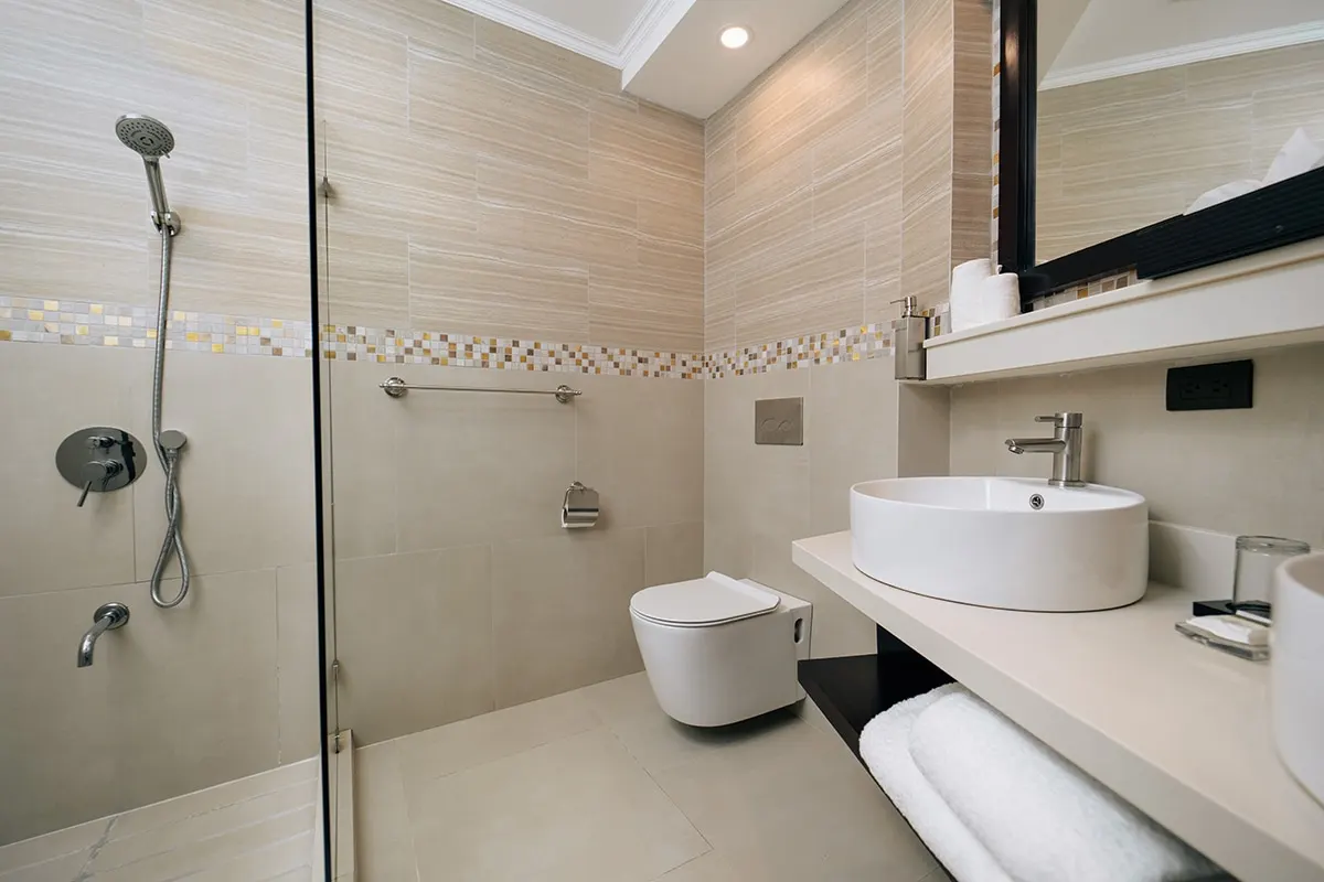 Premium Plus bathroom with a walk-in rain shower and a vessel sink